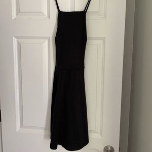 black dress with cross strapped back
